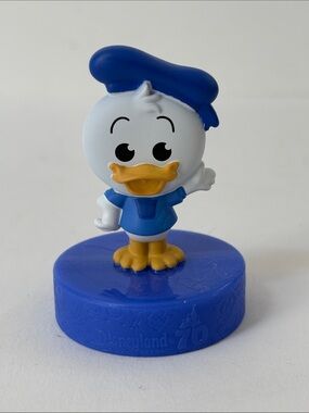 Disney White and Blue Donald Duck Junior Figurine on Blue Base